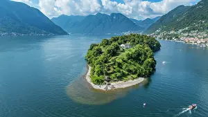 Trails Prints: Aerial view captures Comacina island surrounded by Lake Como's waters and mountains