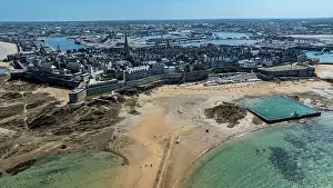 Brittany Prints: Aerial view captures the historic walled city with sandy beach and harbor in Saint-Malo
