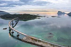 Aerial view of car traveling on Sommaroy bridge at sunset, Sommaroy, Troms county