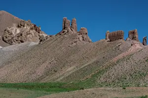 Outcrop Prints: Aerial view of castle Gorgaheen showing structures on a mountain in Afghanistan's landscape during clear weather