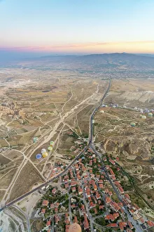 Anatolia Prints: Aerial view of Cavusin and hot air balloons at dawn
