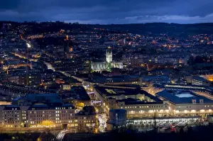 Bath Prints: An aerial view of central Bath shows the Abbey and Southgate development at dusk