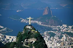 Brazil Prints: Aerial view of city with the Cristo Redentor (Christ the Redeemer) statue in foreground
