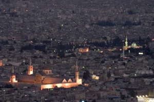 Damascus Prints: Aerial view of city at night including the Umayyad Mosque