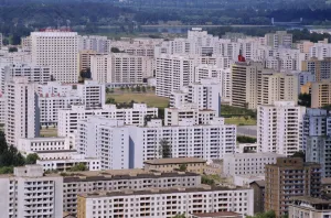 Pyongyang Prints: Aerial view of city skyline with blocks of flats rebuilt