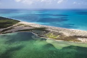 Aerial view of a corner of Barbuda, the Frigate Bird Sanctuary touches a thin strip