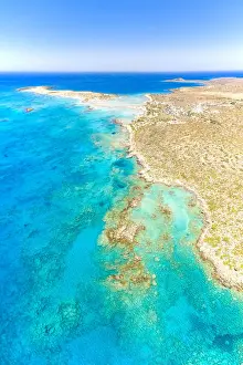Aerial view of crystal transparent sea washing the sand beach of Elafonisi, Crete island, Greek Islands, Greece, Europe