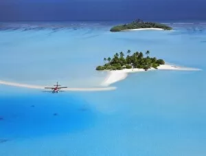Aerial view of desert island with seaplane, South Male atoll, Maldives