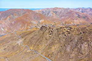 Freeways Prints: Aerial view of desert road in the barren landscape, Mirador del Risco de las Penas