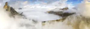 Belluno Prints: Aerial view by drone of fog over Ra Gusela and Lastoi De Formin in autumn, Giau Pass