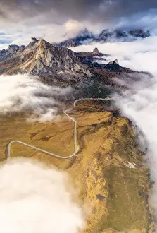 Belluno Prints: Aerial view by drone of Giau Pass, Ra Gusela and Cinque Torri in the mist of autumn