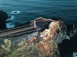 Aerial view of Farolim dos Fenais da Ajuda lighthouse on a cliff, Sao Miguel island, Azores Islands, Portugal, Atlantic, Europe
