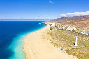 Aerial view of fine sand beach and lighthouse, Morro Jable, Fuerteventura, Canary Islands