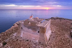 Lighthouses Prints: Aerial view of the fortified tower with the light house built on top of Capo Passero island at sunrise