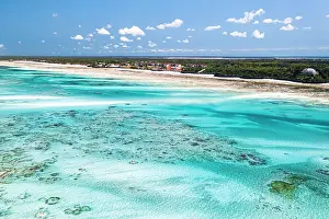 Lagoons Prints: Aerial view of idyllic blue lagoon and nearby white sand beach of Pingwe