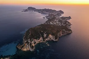 Latina Province Prints: Aerial view of the island of Ponza with typical moon shape at dusk