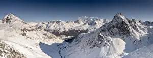 Mountain Pass Prints: Aerial view of Julier Pass mountain road in the snow leading to St