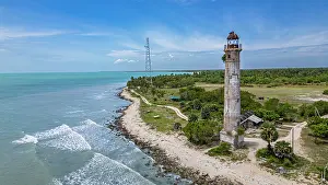 Navigation Prints: Aerial view of Kovalim lighthouse in Sri Lanka near the coastline and surrounding greenery in Jaffna district
