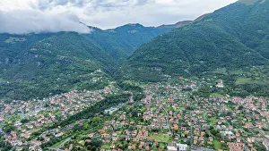 Roads Prints: Aerial view of Lenno with houses and green hills along Lake Como in Italy