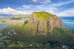 Black River District Prints: Aerial view of the majestic mountain overlooking the ocean, Le Morne Brabant peninsula
