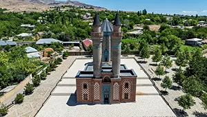 Identity Prints: Aerial view of the Mausoleum surrounded by trees and buildings in Garabaghlar