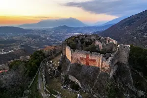 Fortified Wall Prints: Aerial view of the medieval castle of Vicalvi overlooking the valley with red cross painted on the perimetral wall