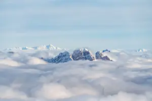 Belluno Province Prints: Aerial view of Monte Cristallo and Pomagagnon peaks emerging from clouds, Dolomites