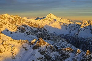 Mount Disgrazia Prints: Aerial view of Mount Disgrazia at sunset, Masino Valley, Valtellina, Lombardy, Italy
