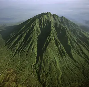 Oldest Prints: Aerial view of Mount Sabyinyo, an extinct volcano and oldest of the Virunga Mountains