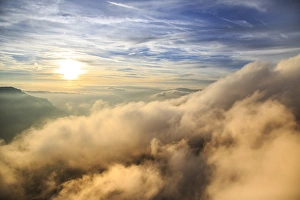 Val Funes Prints: Aerial view of the mountain range of Odle surrounded by clouds, Dolomites, Val Funes