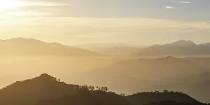 Alajuela Province Prints: Aerial view of mountains near Atena at dawn