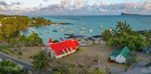 Places Of Worship Prints: Aerial view of Notre-Dame Auxiliatrice de Cap Malheureux at sunrise