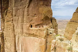 Guidance Gallery: Aerial view of opening carved in rocks, entrance of Abuna Yemata Guh church