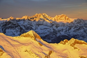 Masino Valley Prints: Aerial view of peak Baroni and Bernina Group at sunset, Masino Valley, Valtellina