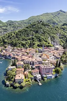Aerial view of the picturesque village of Varenna surrounded by Lake Como and gardens