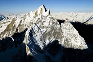 Valtellina Prints: Aerial view of Pizzo Cengalo mountain peak covered with snow, Val Masino, Valtellina