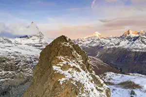 Canton Of Valais Prints: Aerial view of Riffelhorn ridge, Matterhorn and Dent Blanche at sunrise, Zermatt