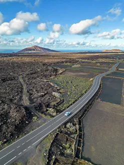 Las Palmas Prints: Aerial view of road through volcanic landscape
