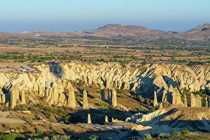 Ancient Ruins Prints: Aerial view of rock formations in Love Valley at sunrise