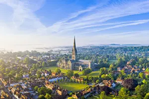 Places Of Worship Prints: Aerial view over Salisbury and Salisbury Cathedral on a misty summer morning, Salisbury