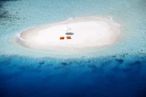 Absence Prints: Aerial view of a sandbank, pillows and sun umbrella, Maldives, Indian Ocean, Asia