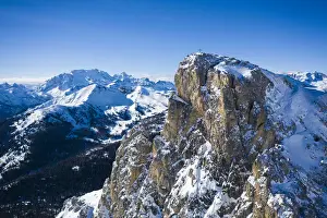 Marmolada Prints: Aerial view of Sass de Stria mountain peak with Marmolada covered with snow in
