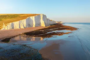 Seven Sisters Prints: Aerial view of Seven Sisters chalk cliffs at sunset