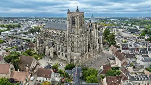 Towers Prints: Aerial view showcases the architectural details of Bourges Cathedral in France among the surrounding cityscape