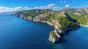 Mallorca Prints: Aerial view showcases Formentor peninsula in Mallorca surrounded by blue water