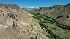Irrigation Prints: Aerial view showcasing castle Gorgaheen surrounded by mountains and farmland in Yaklawang