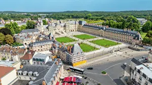 Roads Prints: Aerial view showcasing Fontainebleau Palace and its gardens with surrounding buildings