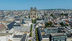 Streets Prints: Aerial view showing Notre Dame cathedral of Reims surrounded by city buildings in France during daylight