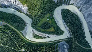 Flowing Prints: Aerial view shows the winding river and green landscape of Rhein gorge with forest