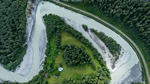 Curve Prints: Aerial view shows winding river and green landscape in Switzerland